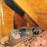 damaged masonry in attic