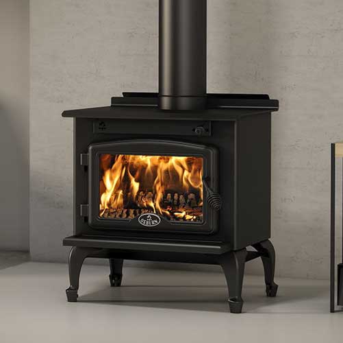 Osburn 900 Wood Stove black freestanding with stove pipe and flames.