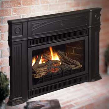 Black gas Fireplace insert with pilars on it's side and fire burning in it