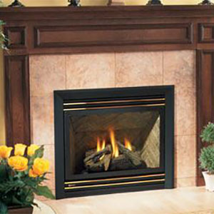 Brown wooded hearth with pink porcelan brick and black fireplace insert with fire burning in it