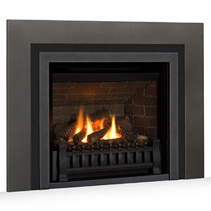 black fireplace insert with fire burning in it