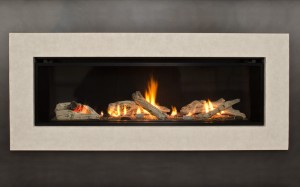 rectangular fireplace insert with off white framing and firewood burning inside